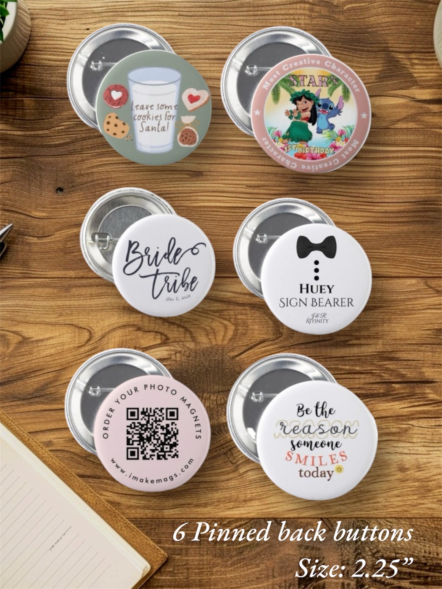 2.25-inch pinned-back buttons set displayed on a wooden table, featuring various custom designs including Christmas cookies for Santa, birthday cartoon character button, Bride Tribe design, ring bearer button, QR code photo magnet button, and inspirational quote button.