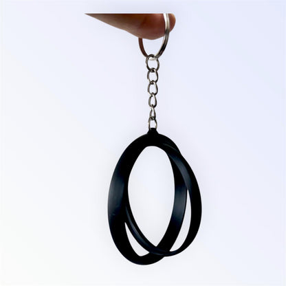2.25-inch rotating button keychain blank for standard flat back buttons, double-sided spinner keychain available in six colors for custom button designs.