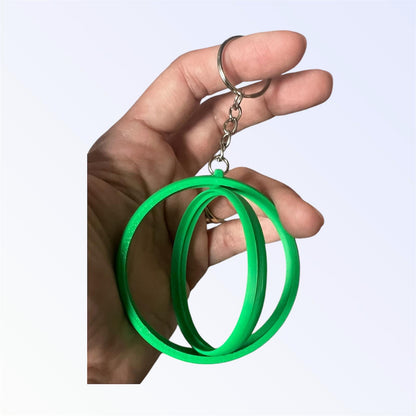 Green 2.25-inch rotating button keychain blank designed for standard flat back buttons, double-sided spinner keychain for custom button makers and DIY crafts.