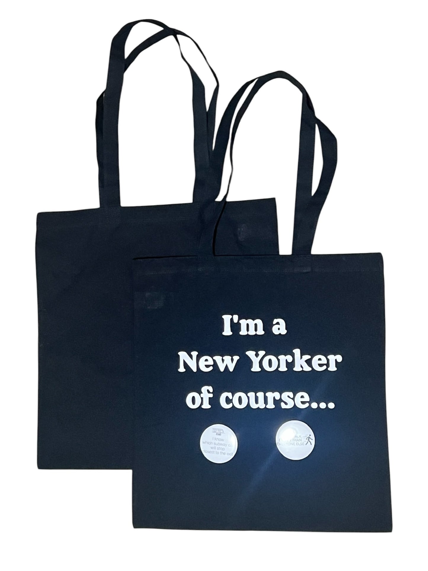 Black canvas tote bag featuring "I'm a New Yorker, Of Course..." design, funny New York themed reusable shopping bag and NYC gift.