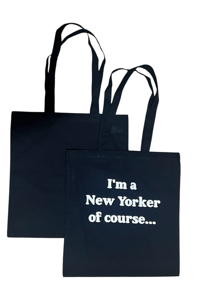 Black canvas tote bag featuring "I'm a New Yorker, Of Course..." design, funny New York themed reusable shopping bag and NYC gift.