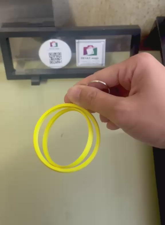 Yellow 2.25-inch rotating button keychain blank designed for standard flat back buttons, double-sided spinner keychain for custom button makers, promotional products, and DIY crafts.