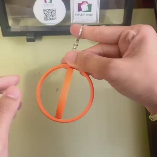 Orange 2.25-inch rotating button keychain blank designed for standard flat back buttons, double-sided spinner keychain for custom button makers and DIY crafts.
