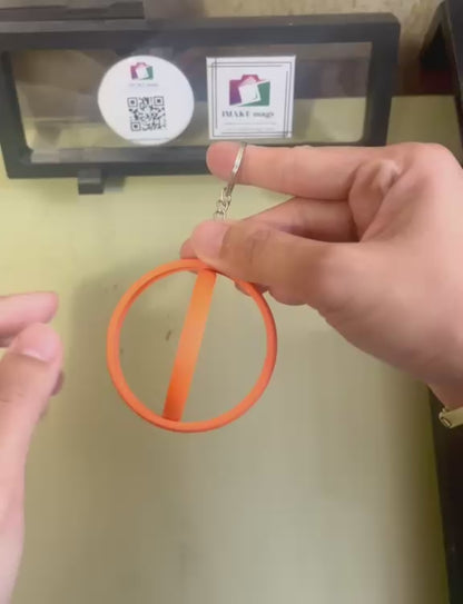 Orange 2.25-inch rotating button keychain blank designed for standard flat back buttons, double-sided spinner keychain for custom button makers and DIY crafts.